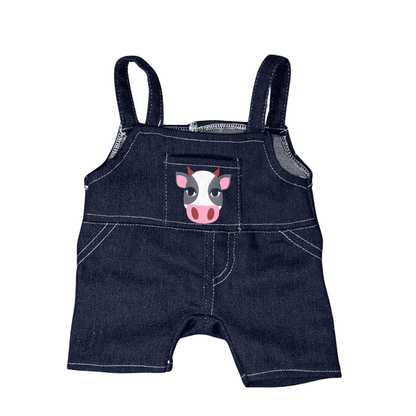 Boeren overall voor knuffel - Make a bear De tuinbroek van de boerenaoverall voor knuffels. Is van een jeans stof gemaakt. Heeft aan de achterkant een gaatje voor de staarten van de knuffels.