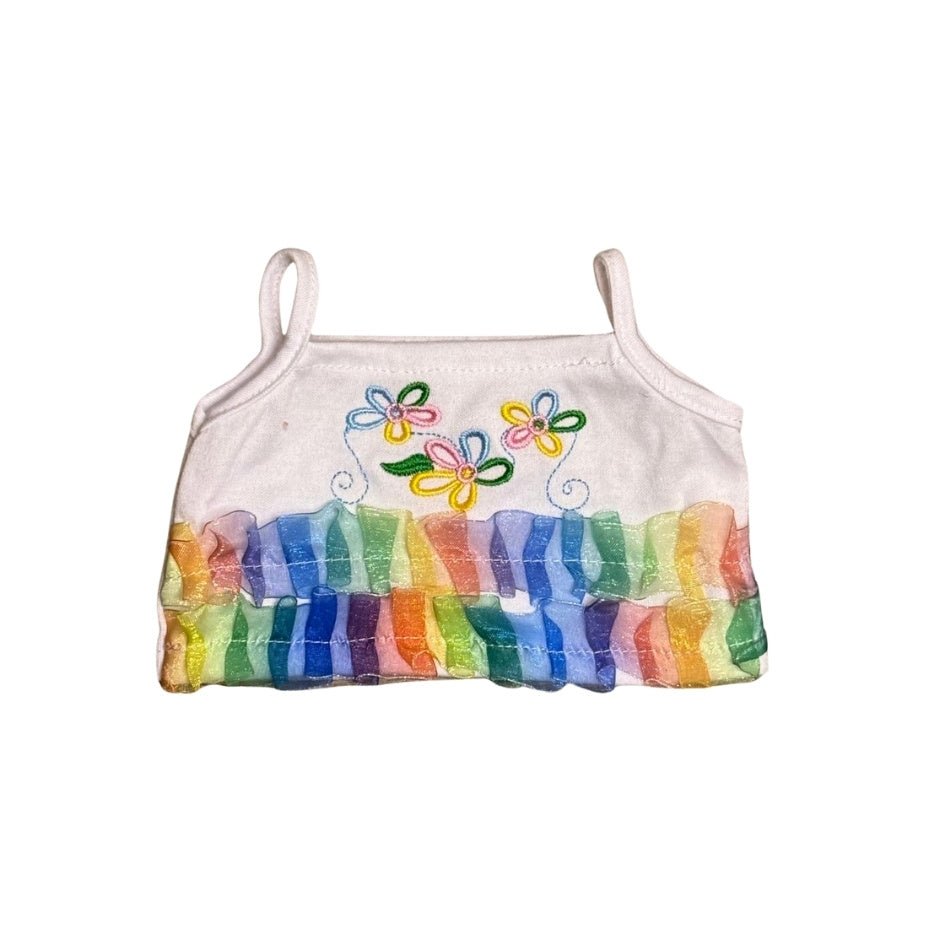 Flower jeans set - voor knuffel - Make a bearHet topje van het setje Flower jeans. Een outfit voor knuffel, te koop bij Make a Bear. Het topje heeft bloemetje borduring, is kleurrijk.
